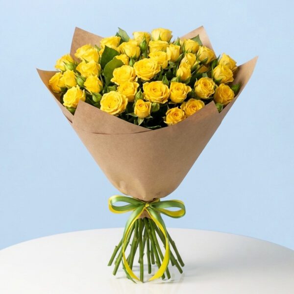 A vibrant bouquet of yellow roses, known as enlightening yellow spray roses, wrapped in brown paper
