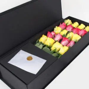 Yellow and Purple Roses in a black box