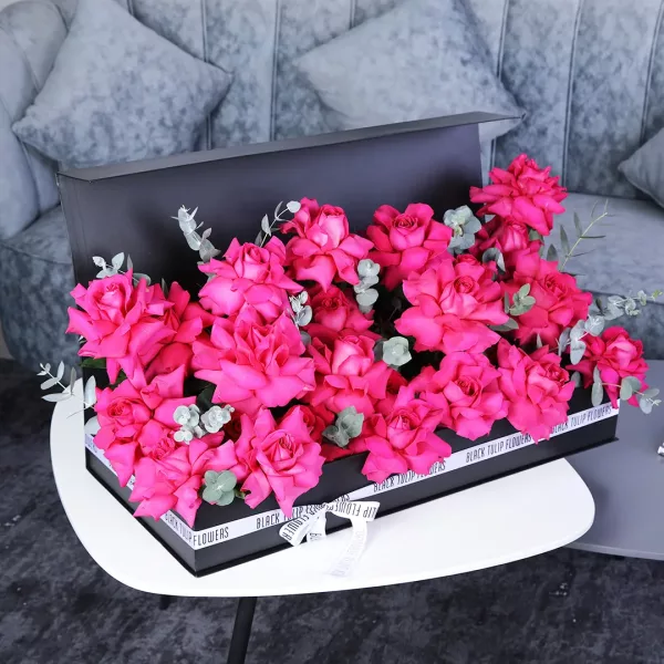 pink flower box black tulip flowers oman