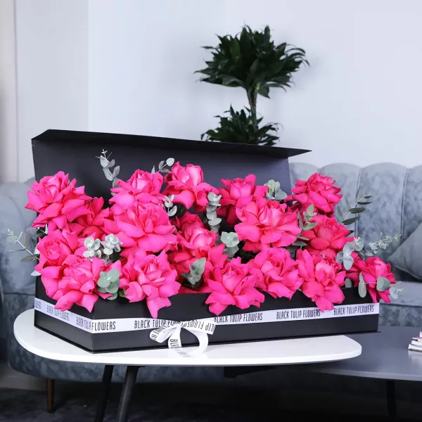 pink flower box black tulip flowers oman