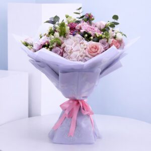 A vibrant bouquet of mixed flowers designed to uplift spirits and bring joy to the recipient.