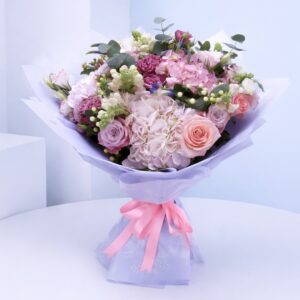 A vibrant bouquet of mixed flowers designed to uplift spirits and bring joy to the recipient.