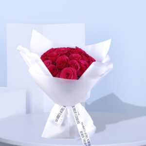 20 bright Hotspot roses arranged elegantly in a beautiful bouquet.