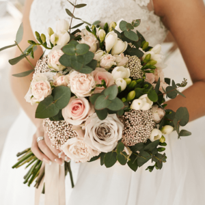 An exotic bridal bouquet is a unique and eye-catching floral arrangement that features unconventional, tropical, or vibrant flowers.