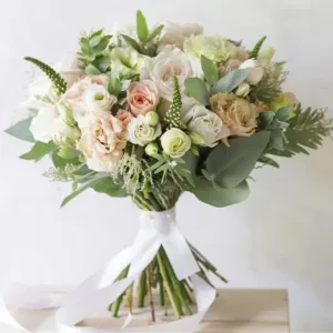 Pastel Hand Bouquet Online – Spell love with this Intriguing pastel Hand Bouquet which consists of Mixed flowers of Roses, Lisianthus, Veronica and Eucalyptus.