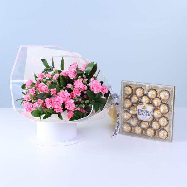 blush-petal-carnation-ruscus-chocolate-wrap Hand-tied light pink carnation bouquet with Ferrero chocolates and decorative wrap