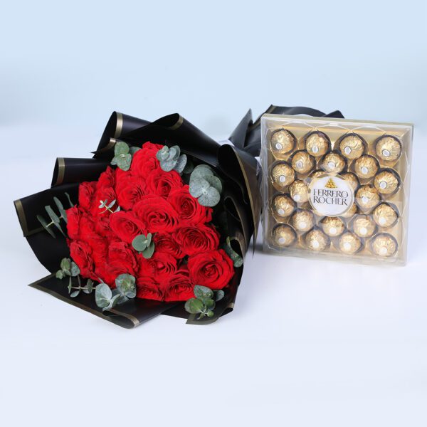 A bouquet of 20 red roses and Ferrero Rocher chocolates combined in a luxurious arrangement.