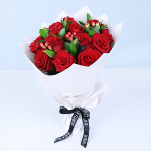 Valentine’s 12 red roses wrapped with greenery for a loved one