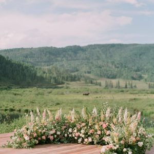 Grounded Floral Arch Garden roses, Alcea rosea, floret snapdragons, Grounded Floral Arches.